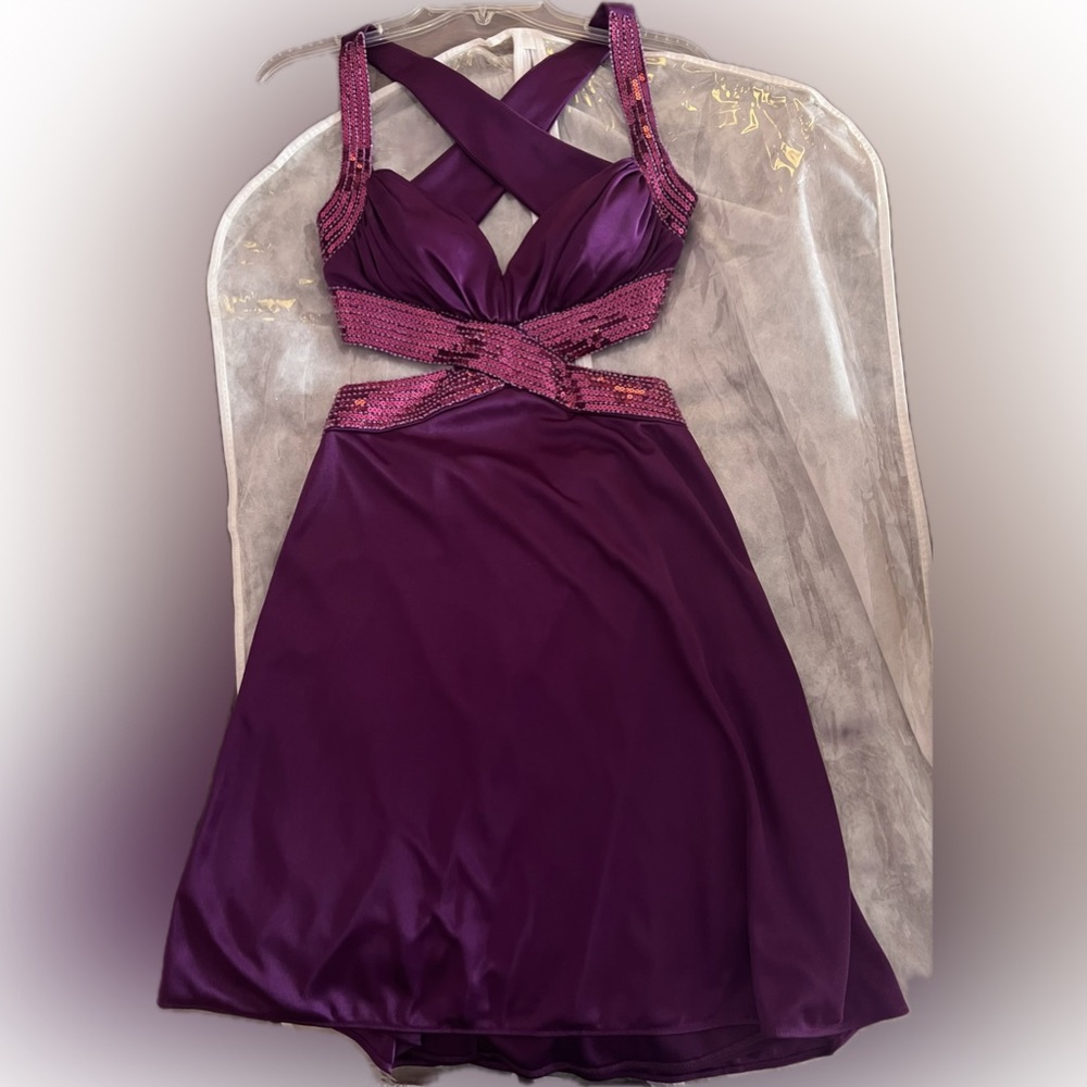 Windsor masquerade homecoming/prom dress. Strapless with open back and sequins.